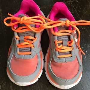 Under Armor pink and orange tennis shoe toddler